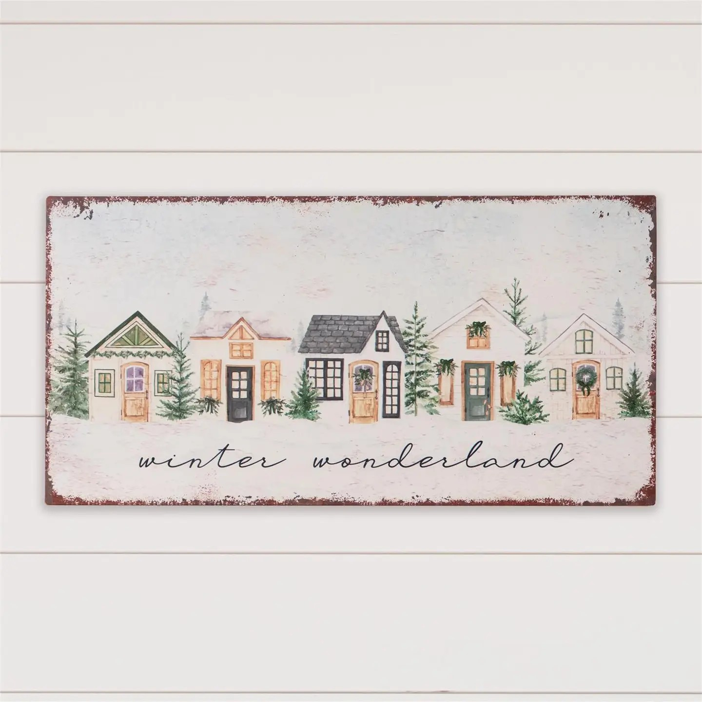 cozy winter cottages metal sign