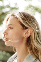 after hours earrings in emerald