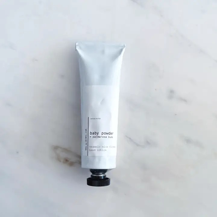 baby powder + palmarosa buds organic hand lotion