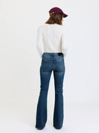 lover mid rise flare in stay wild