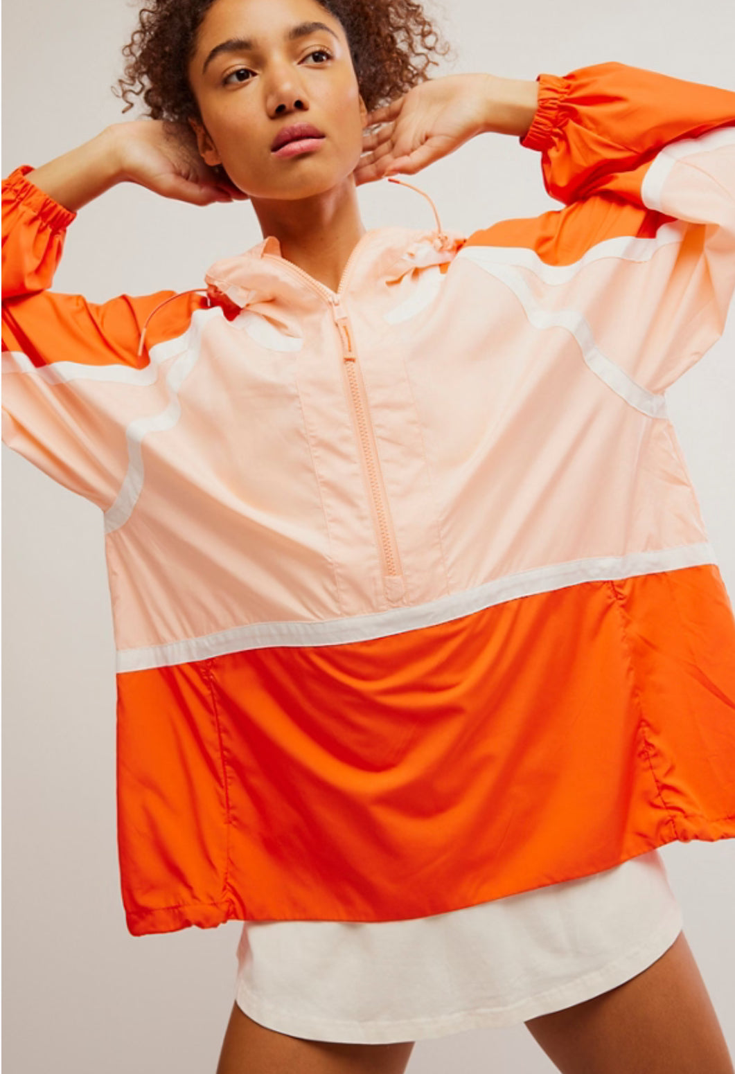 like the wind colorblock jacket in peach combo
