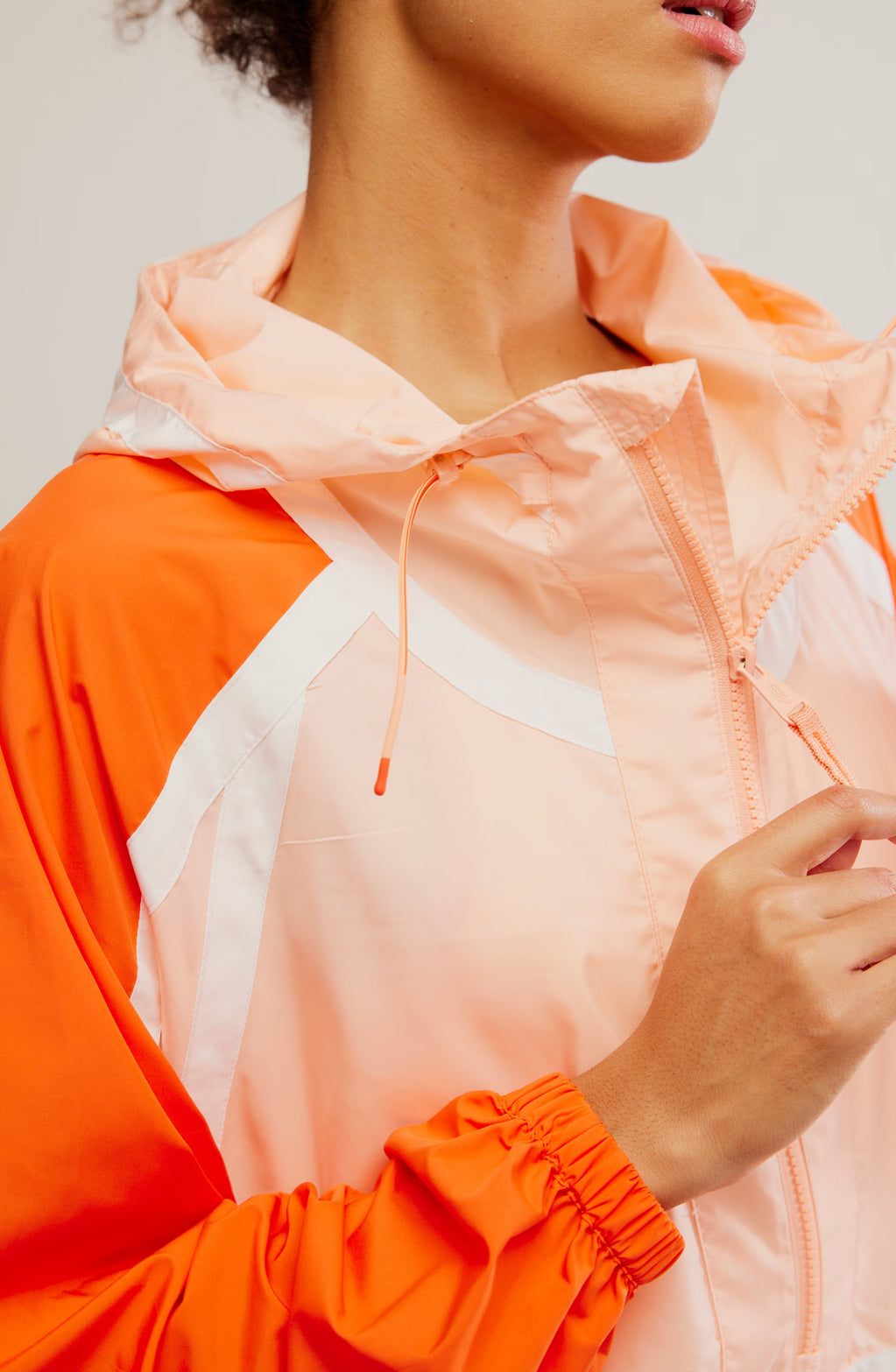 like the wind colorblock jacket in peach combo