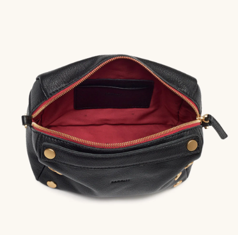 evan crossbody small in black with red zip