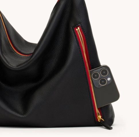 large kyle in black with red zip