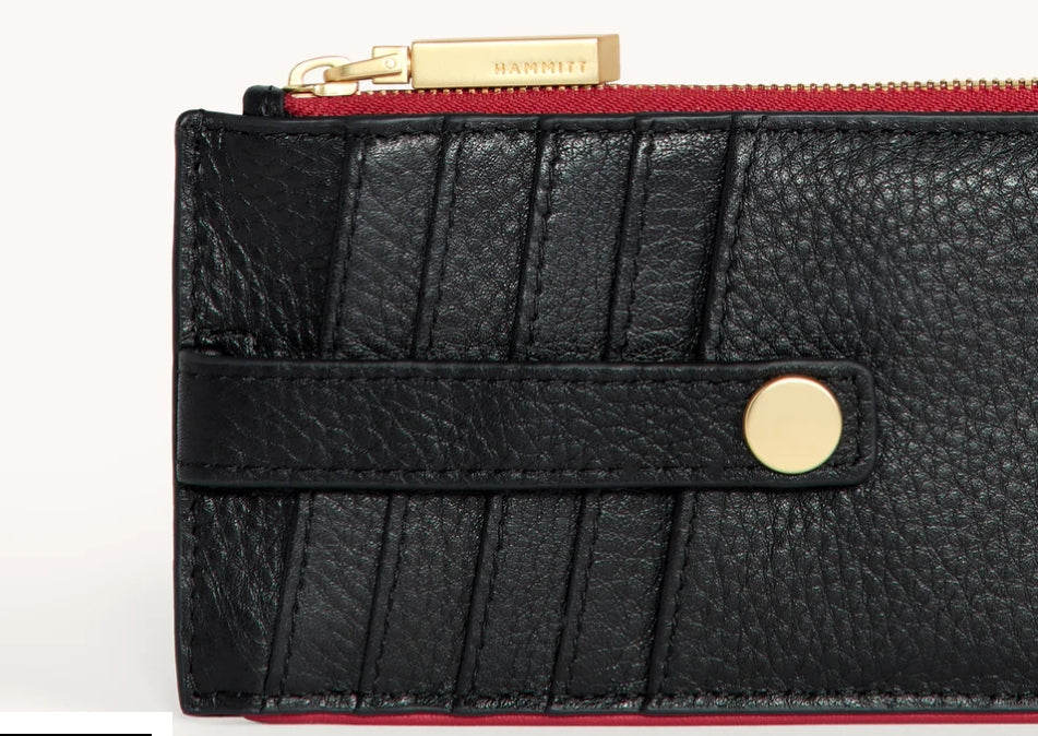 210 west in black + brushed gold with red zip