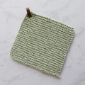 knitted green pot holder