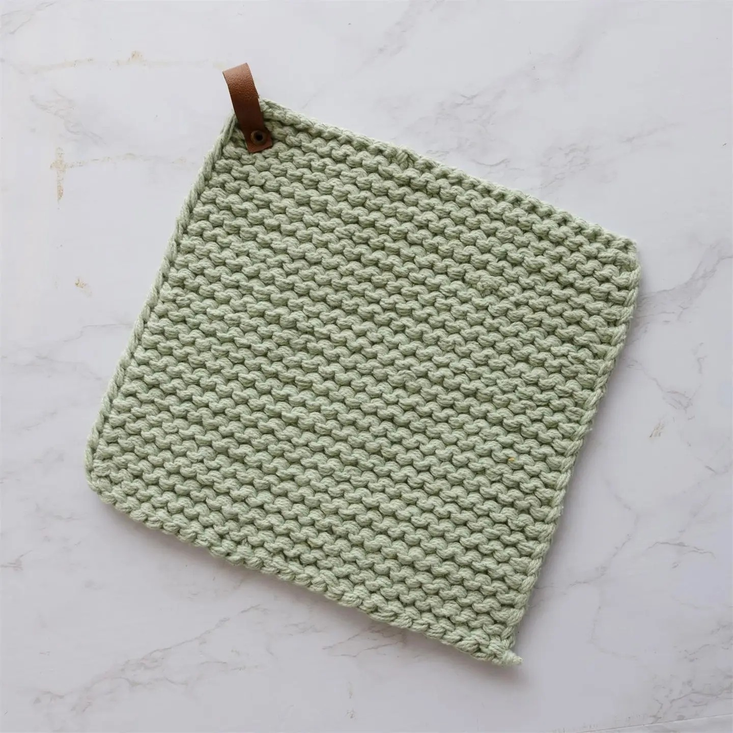 knitted green pot holder