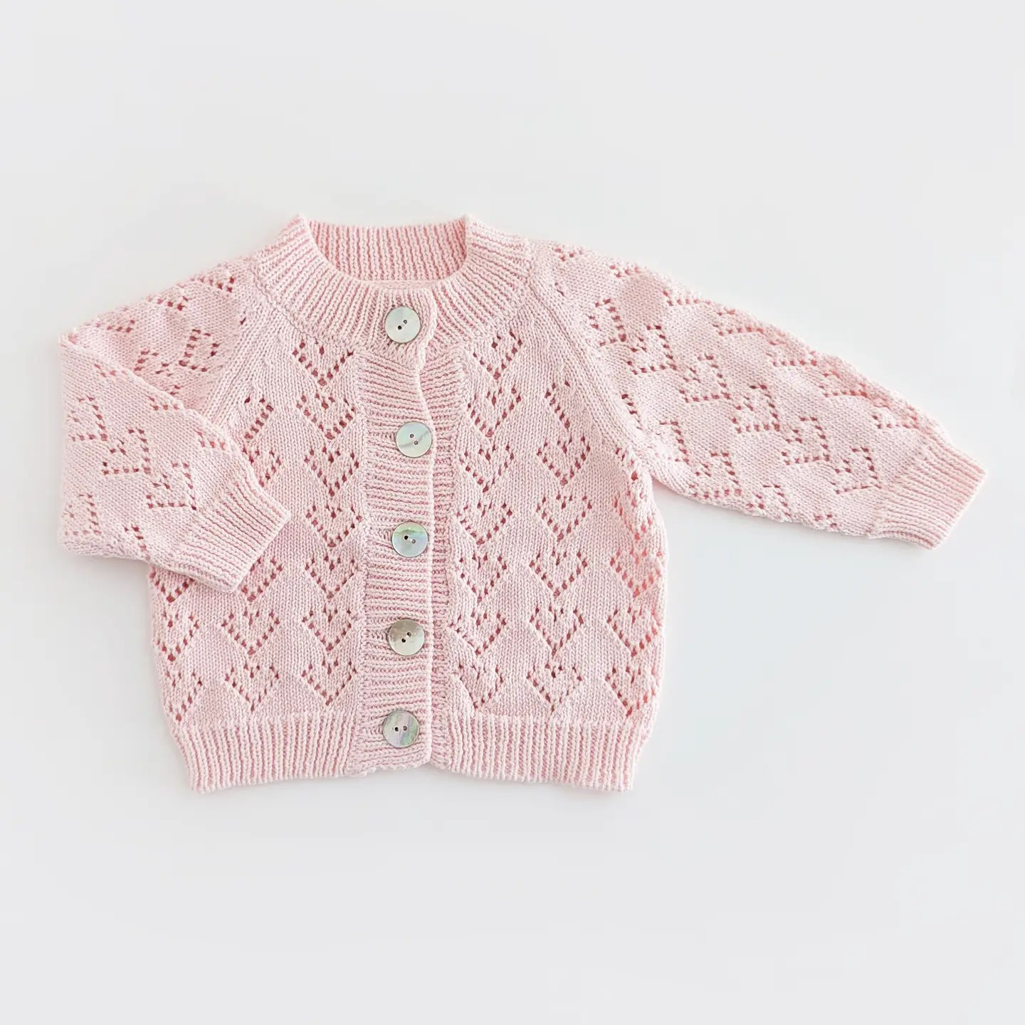 heart lace baby cardigan in blush pink
