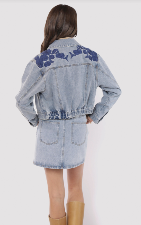 most likely embroidered denim jacket