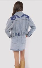 most likely embroidered denim jacket