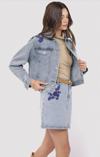 most likely embroidered denim jacket