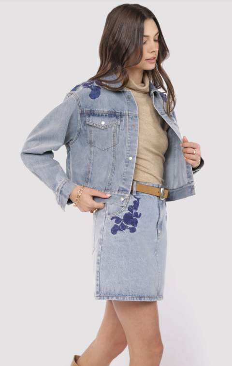 most likely embroidered denim jacket