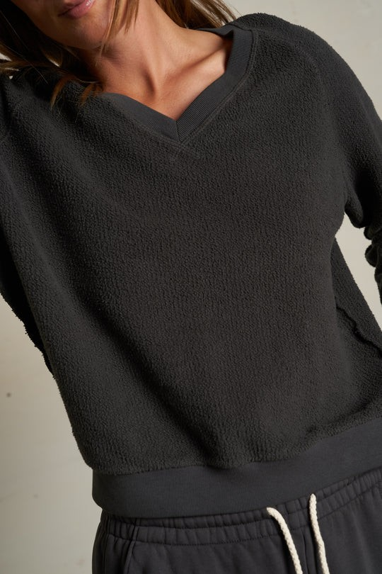 zuri reverse fleece v neck sweatshirt