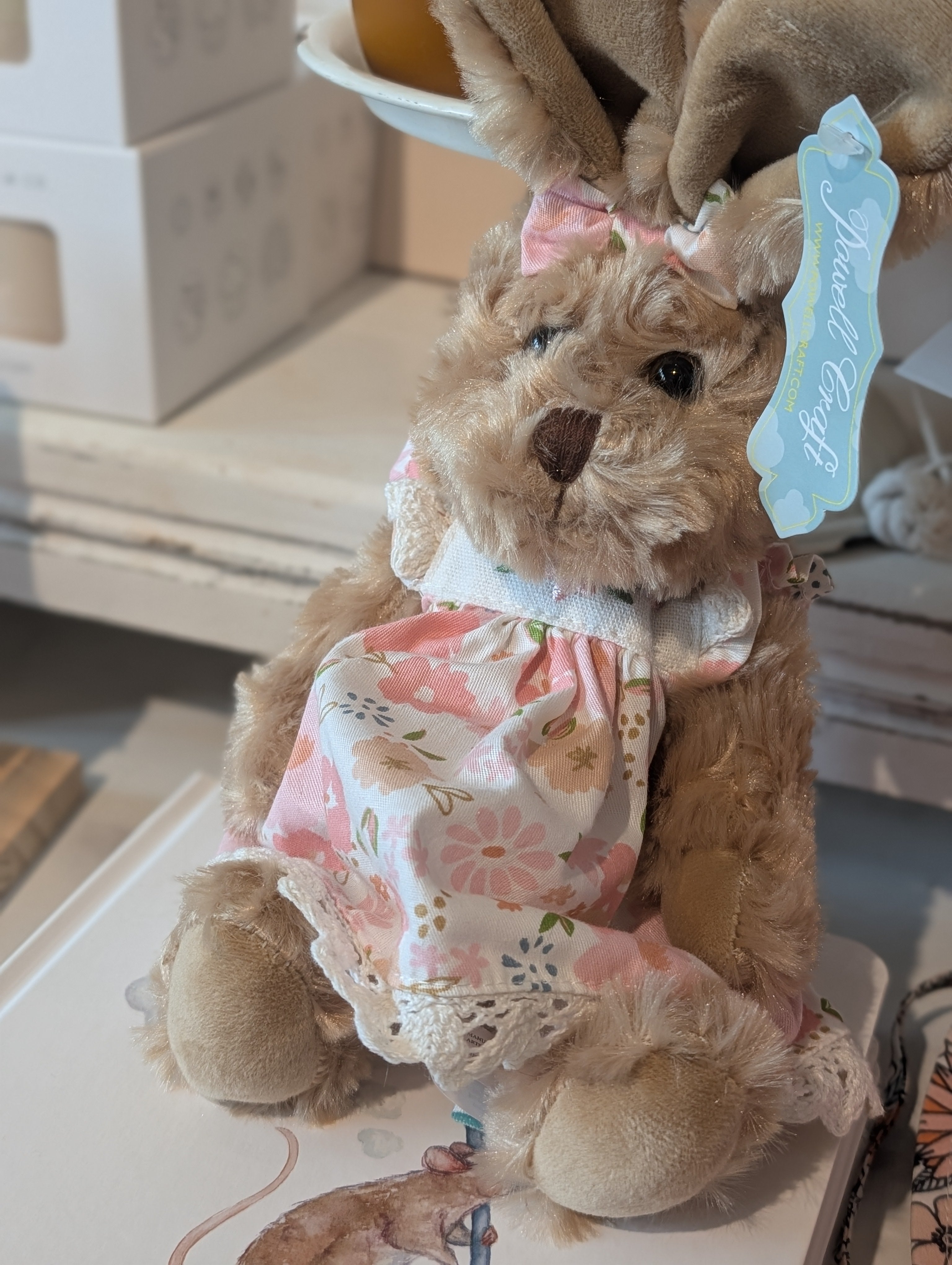 small rabbit in pink floral dress