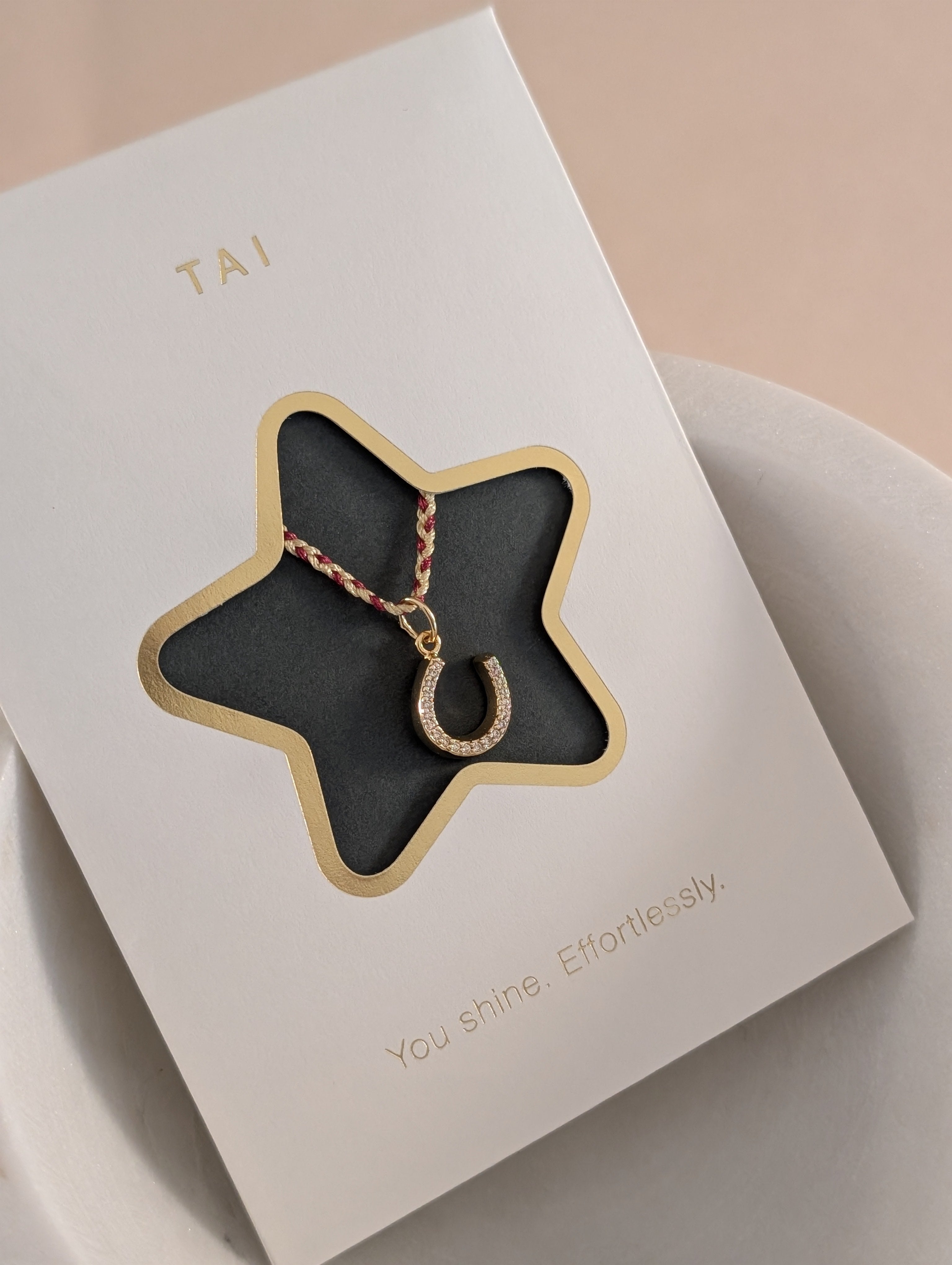 braided horseshoe necklace