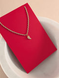 braided horn charm necklace